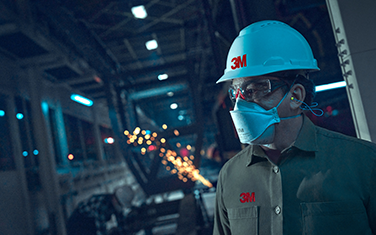 Worker wearing a face mask